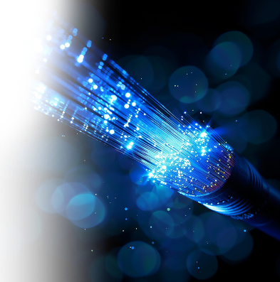 Illuminated fiber-optic cables showcasing high-speed data transmission, representing dark fiber and dedicated bandwidth