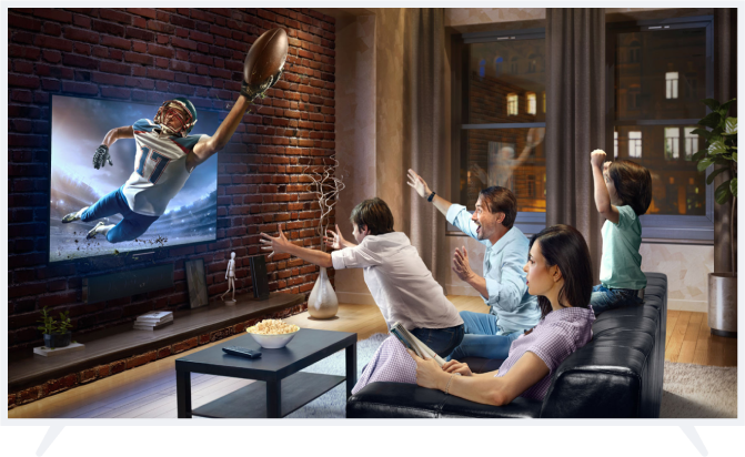 Family watching sports on cable tv